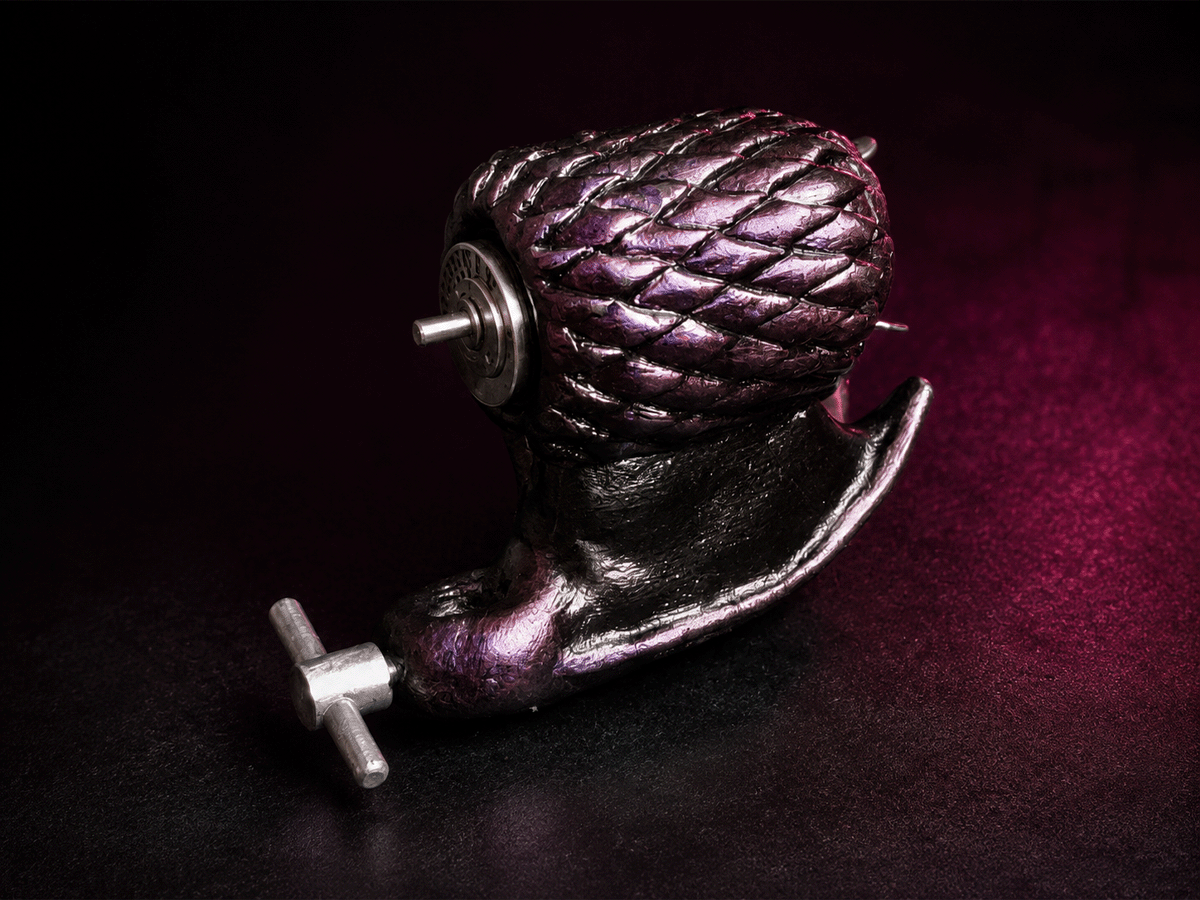 Completed functional Medusa rotary tattoo machine connected to its power system